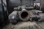 A captured Russian T-72B3 tank awaits repairs on February 13, 2023, at a warehouse in eastern Ukraine. (Source: Getty Images)