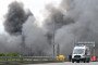 Police take security measures as black smoke billows from the area of Gazprom Neft’s Moscow oil refinery, located on the southeastern outskirts of Moscow, on June 18, 2026. (Source: Getty Images)