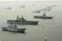 Illustrative image. An aerial view of (L-R) HMS Invincible, USS Saipan, and FS Charles de Gaulle with some of the 112 warships gathered in the Solent ahead of the International Fleet Review on June 26, 2005, in Portsmouth, England. (Source: Getty Images)
