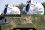 China Unveils New Weapons In V-Day Parade BEIJING, CHINA - SEPTEMBER 03: The LY-1 shipborne laser weapon of ship-based air defense weapons formation pass through Tian'anmen Square during the V-Day military parade on September 3, 2025 in Beijing, China. Ch