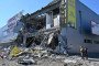 People look at a supermarket partially destroyed by a missile attack on the southeastern outskirts of the Ukrainian city of Kharkiv on June 8, 2022. Illustrative photo. (Source: Getty Images)