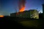 Fire and smoke rise from a damaged barracks building at the base of Russia’s 126th Separate Coastal Defense Brigade in Perevalne, occupied Crimea. (Source: Dosye Shpiona)