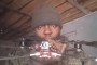 Ayebusiwa Olabode Victor posing with a drone while serving in the Russian Armed Forces. (Source: HUR)