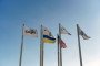 The flags of funding companies sit alongside those of Ukraine and United States in the grain terminal, operated by Cargill Inc. and M.V. Cargo, at Yuzhny Port in Yuzhny, Ukraine. (Source: Getty Images)