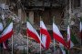Iranian national flags are placed in front of the ruins of a building in Tehran, Iran. (Source: Getty Images)
