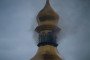 Smoke rises from a fire on the roof of the Dormition Cathedral of the Kyiv Pechersk Lavra. (Source: Getty Images)