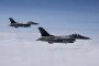 Romanian Air Force F-16 fighter jets participate in a NATO Air Policing exercise over Allied airspace, July 4, 2023. (Source: Getty Images)