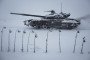 Ukrainian tanks move on snow covered road as military mobility continues within the Russian-Ukrainian war in Donbas, Ukraine, on February 18, 2023. (Source: Getty Images)