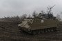 An M113 armored personnel carrier stands on the field on January 16, 2025, in the Donetsk region, Ukraine. (Source: Getty Images)