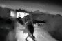 A Russian MiG-29 fighter jet at Belbek air base in occupied Crimea before being struck during a Ukrainian HUR drone operation. (Source: HUR)
