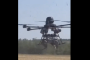 Video Shows Ukrainian Vampire Drone Delivering Robotic Dog to the Frontline