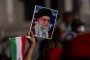 A demonstrator holds a portrait of Iran’s Supreme Leader Ayatollah Ali Khamenei, February 28, 2026. (Source: Getty Images)