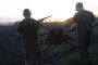 Ukrainian soldiers of the 127th Heavy Mechanized Brigade carry a Heavy Shot UAV across a field. (Source: Getty Images)