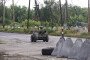 A ground drone travels along a road protected by anti-drone nets in Donetsk region, Ukraine, on June 20, 2026. (Source: Getty Images)
