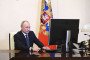 Russian leader Vladimir Putin casts his vote electronically during presidential elections in Moscow, Russia, on March 15, 2024.