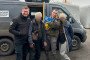 Evacuation volunteers stand with two residents and their dog after safely bringing them out of a frontline area in Donetsk on November 12, 2025. (Source: Diana Yakovleva/Instagram)