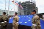 Eurocorps soldiers carry a European Union flag during the flag-raising ceremony in Strasbourg, eastern France. (Source: Getty Images)