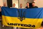 Ed Sheeran and members of Antytila pose with a UNITED24 Ukrainian flag, showing their support for Ukraine following their collaboration. (Source: Antytila/Instagram)
