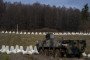 Polish armored vehicles and anti‑tank defenses are deployed at a newly constructed section of the East Shield fortifications near Poland’s border with Russia in Dąbrówka, Poland, on November 30, 2024. (Photo: Getty Images)