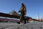 A man in Russian military unoform, walks past the Kremlin, at Red Square, April 24, 2024, in Moscow, Russia. Illustrative photo. (Source: Getty Images)