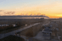 Thick black smoke rises over the Tolyattikauchuk chemical plant in Russia’s Samara region following a drone attack on October 24, 2026. (Source: Exilenova+)