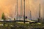 Firefighters work to extinguish active blazes in the Chornobyl exclusion zone after fallen Russian drones ignited multiple forest fires across the area. (Source: SAEZ)