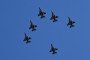 F-16 Fighting Falcon jets overfly the 9 de Julio avenue in Buenos Aires. (Source: Getty Images)