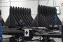 Stacks of black-painted drone fuselages await final assembly as teams continue construction at Russia’s Yelabuga drone plant. (Source: Zvezda TV)