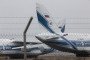 The tails of two Russian Antonov An-124 cargo aircraft. (Source: Getty Images)