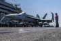 An F/A-18E Super Hornet, attached to Strike Fighter Squadron (VFA) 151, taxis the flight deck of the Nimitz-class aircraft carrier USS Abraham Lincoln (CVN 72) in support of Operation Epic Fury on March 2, 2026. (Source: Getty Images)