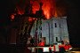 Firefighters on a lifting platform extinguish a fire on the roof of the Dormition Cathedral of the Kyiv Pechersk Lavra. (Source: Getty Images)