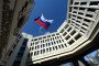 A Russian flag flies in the courtyard of the parliament building in Simferopol, Crimea, on March 18, 2014. (Source: Getty Images)