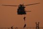 Italian military personnel rappel from a helicopter during the boarding of the tanker Toa Payoh, August 2, 2026. (Source: Italian Defense Ministry)