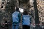 UN workers inspect a residential building damaged by an air strike in Kharkiv, Ukraine, September 24, 2024. (Source: Getty Images)
