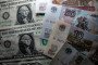 In this photo illustration, Russian rouble notes are seen besides one Dollar bill notes on January 11, 2025 in Bath, England. Illustrative photo. (Source: Getty Images)