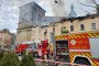 Firefighters extinguish a fire on building in center of city after Russian drone attack on March 24, 2026 in Lviv, Ukraine. (Source: Getty Images)