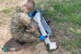 SBU specialist inspects a missile from a downed Russian Geran-2 drone armed with an R-60M missile, 2026.