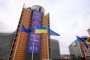 EU and Ukrainian flags fly in the wind in front of the Berlaymont, the EU Commission headquarter for the 4th year anniversary of the full scale invasion of Ukraine by Russia, on February 23, 2025 in Brussels, Belgium. (Source: Getty Images)
