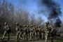 Recruits, supervised by instructors, cover a distance on Day Zero of Basic Military Training at the 118th Separate Mechanised Brigade of the Ukrainian Armed Forces, April 5, 2026. Illustrative photo. (Source: Getty Images)