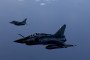 A French Mirage 2000D and Rafale fighter jet fly over France’s southwest coast during the Volfa 2025 joint military drills, September 26, 2025. (Source: Getty Images)